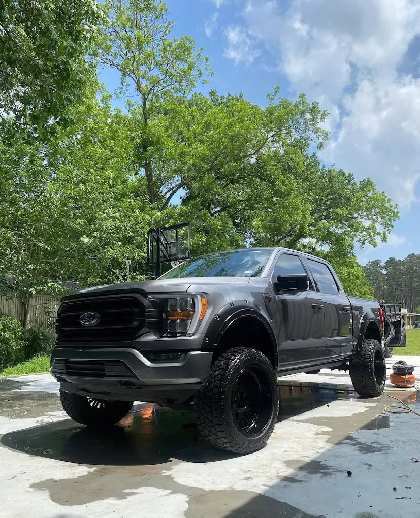 Lifted Ford F-150 after a full exterior wash and wheel detail