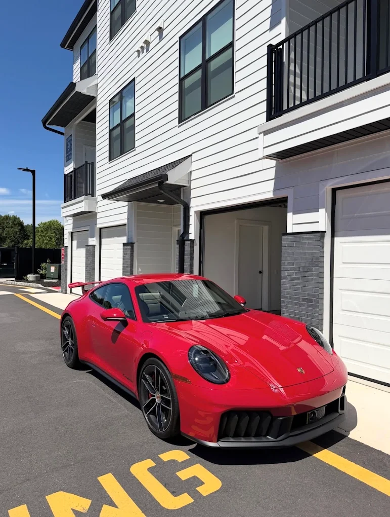 Red Porsche 911 after a full exterior wash and paint enhancement